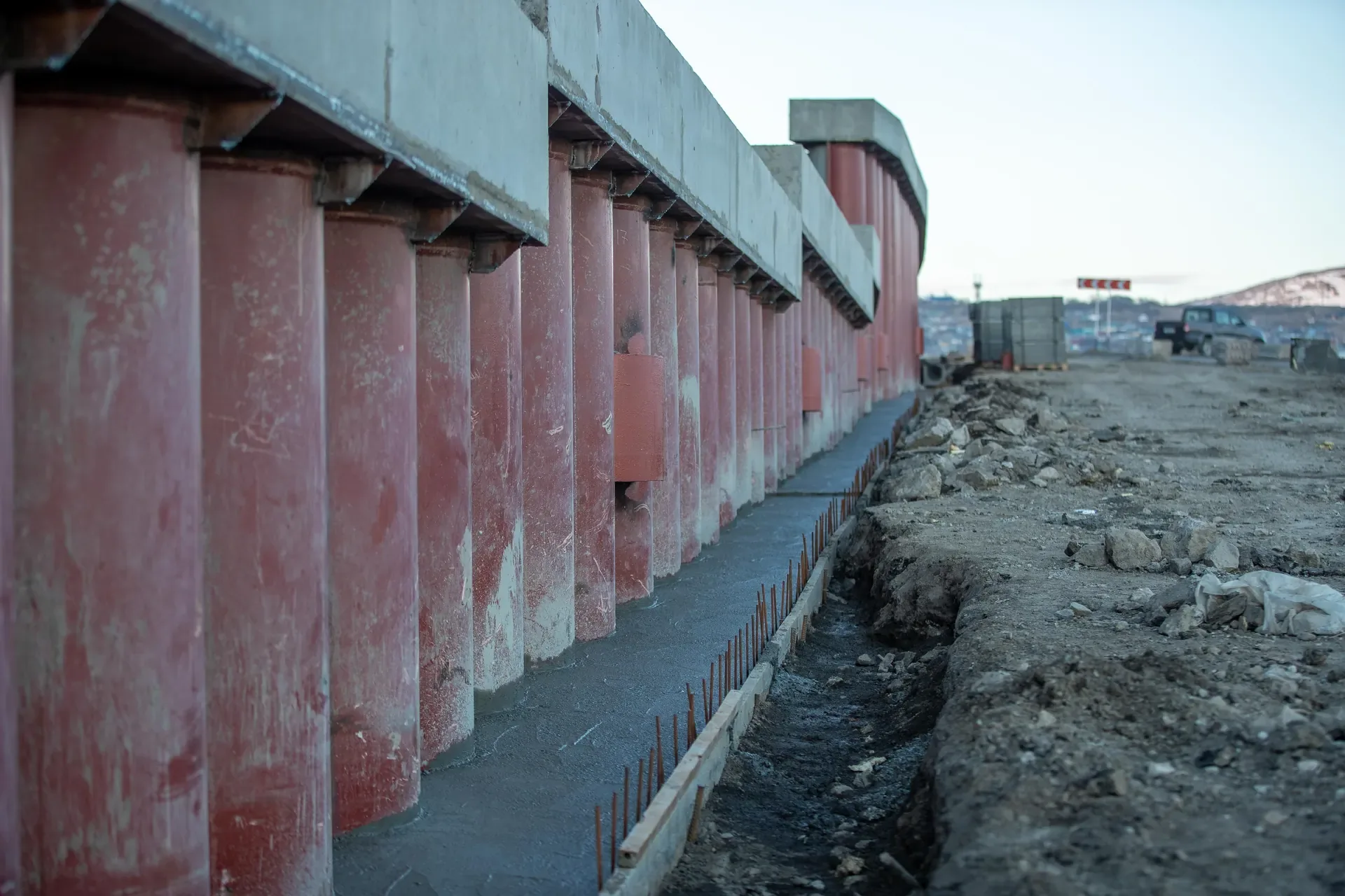 Open trench along a building for an underground cable run